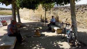 Locals at Tirgo protecting from the Sun.